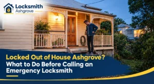 Man standing on the front porch of a Queenslander home in Ashgrove, checking his pockets after being locked out
